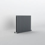 Flat_Double_Anthracite_ horizontal radiator on a light gray background