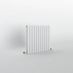 Modern Flat panel horizontal White radiator on a light gray background