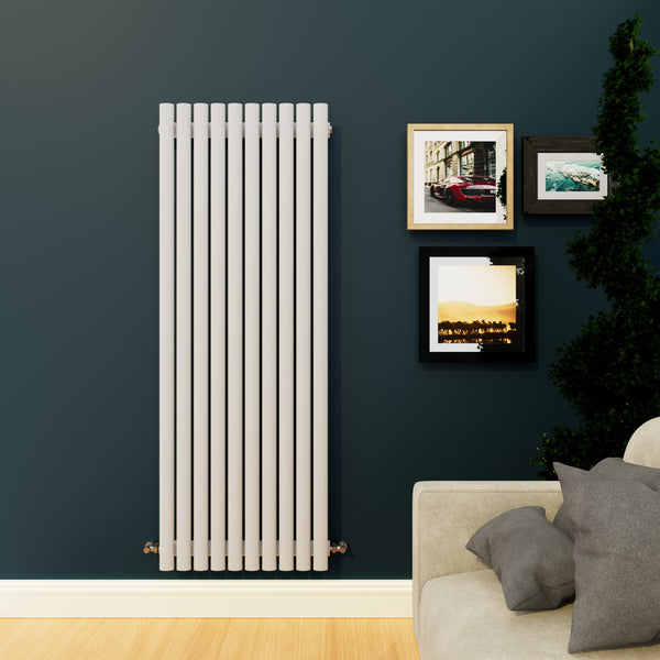 vertical, oval panel , white radiator on a green wall on a green wall