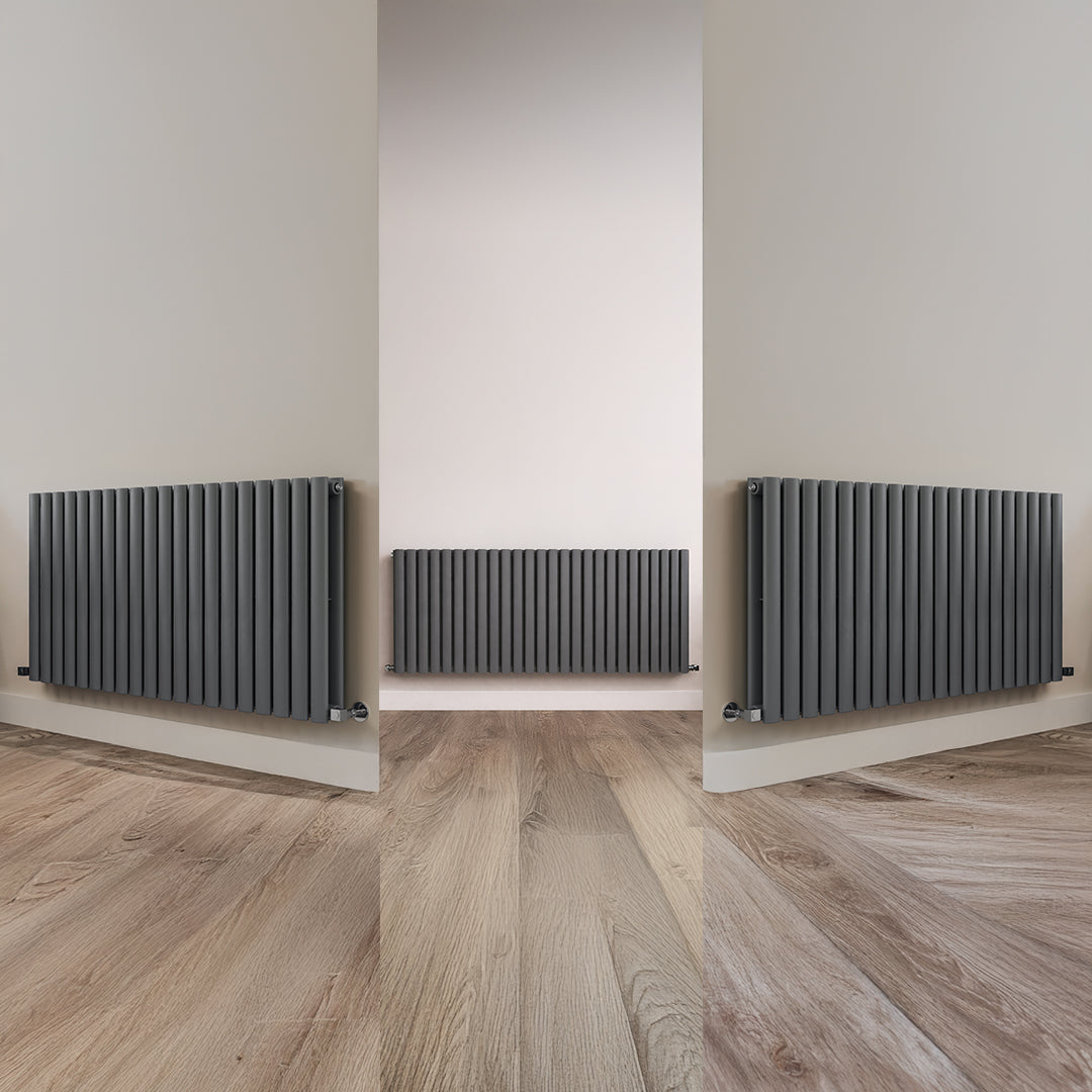 Three views of a dark gray radiator against a light wall with wooden flooring.