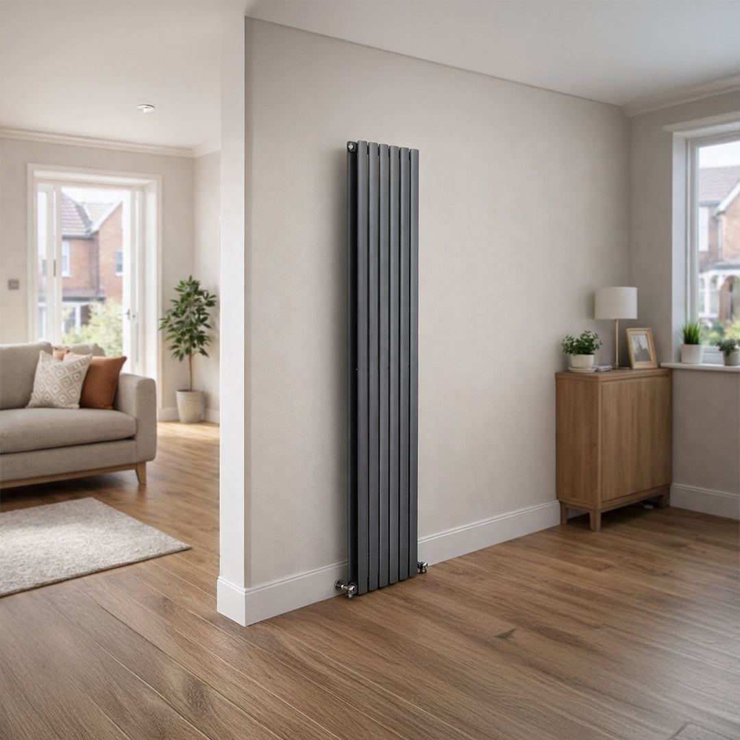 Tall vertical radiator in a living room with wooden flooring and neutral decor.