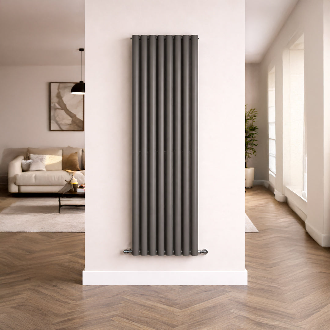 Vertical radiator on a white wall in a living room setting
