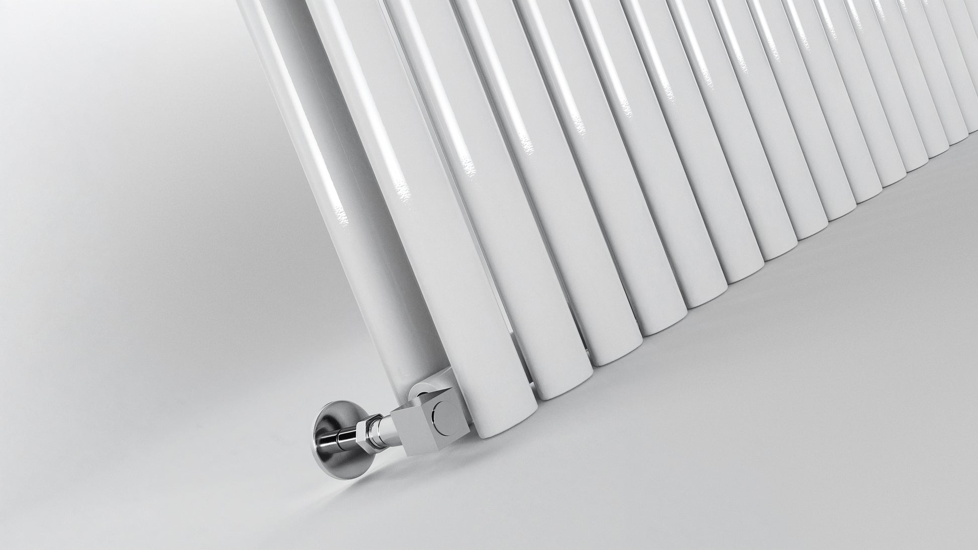 DOUBLE_OVAL White radiator on a light gray background